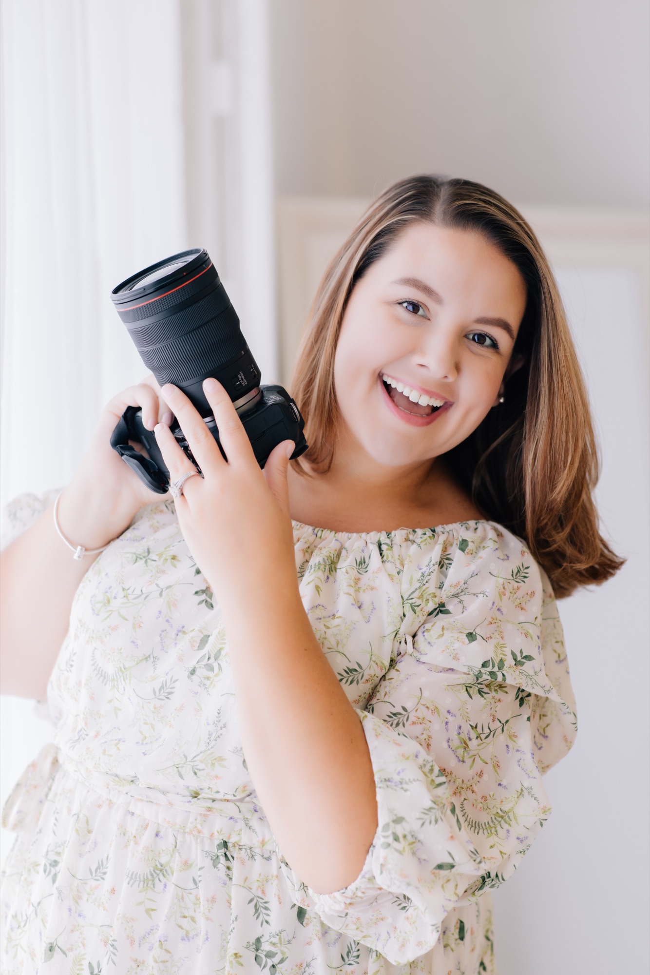 Marie Herrera with her camera in the Four Little Birds studio