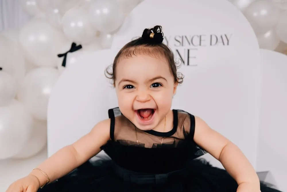Child at play, captured mid-laugh