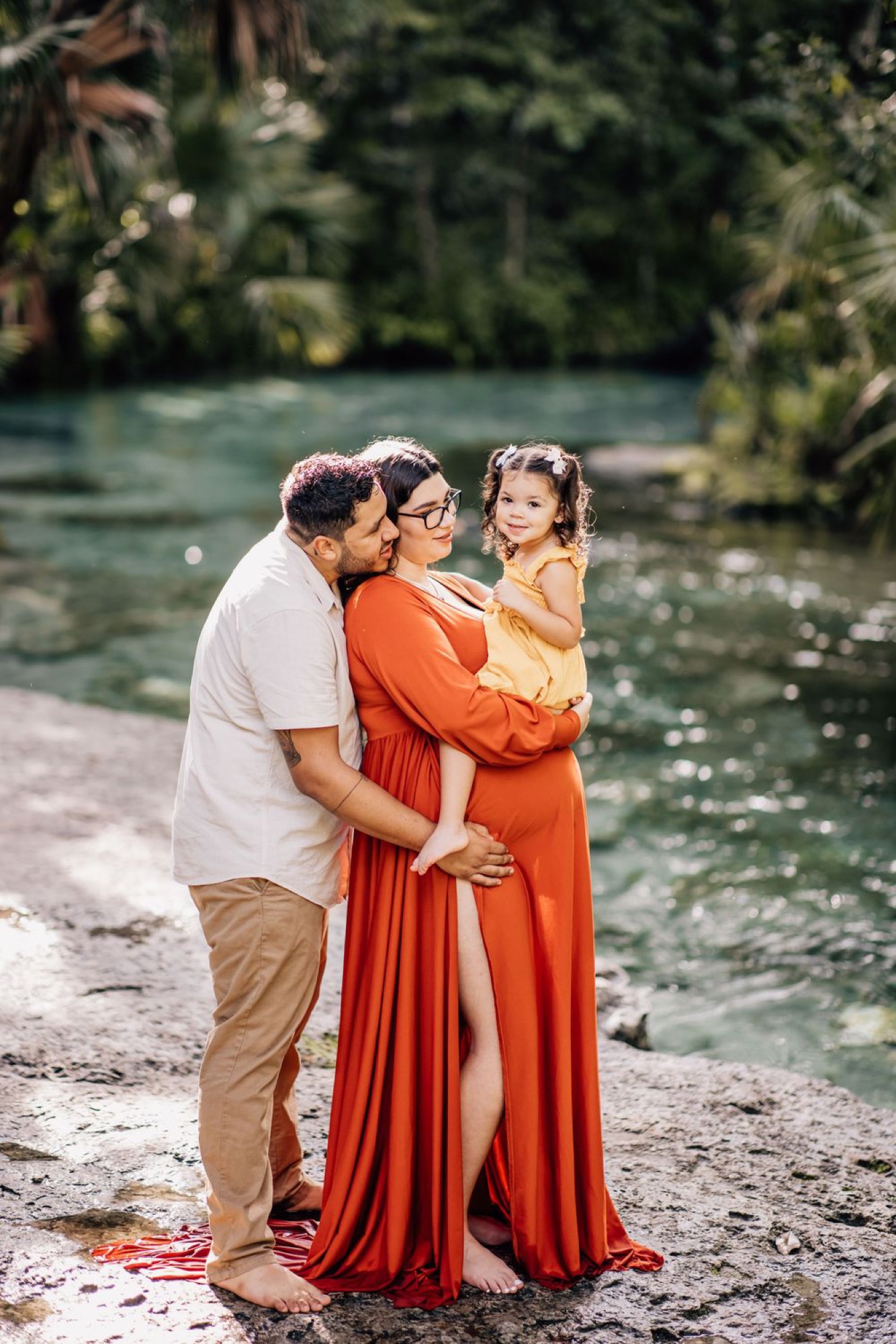 Family cuddled together during a connection session