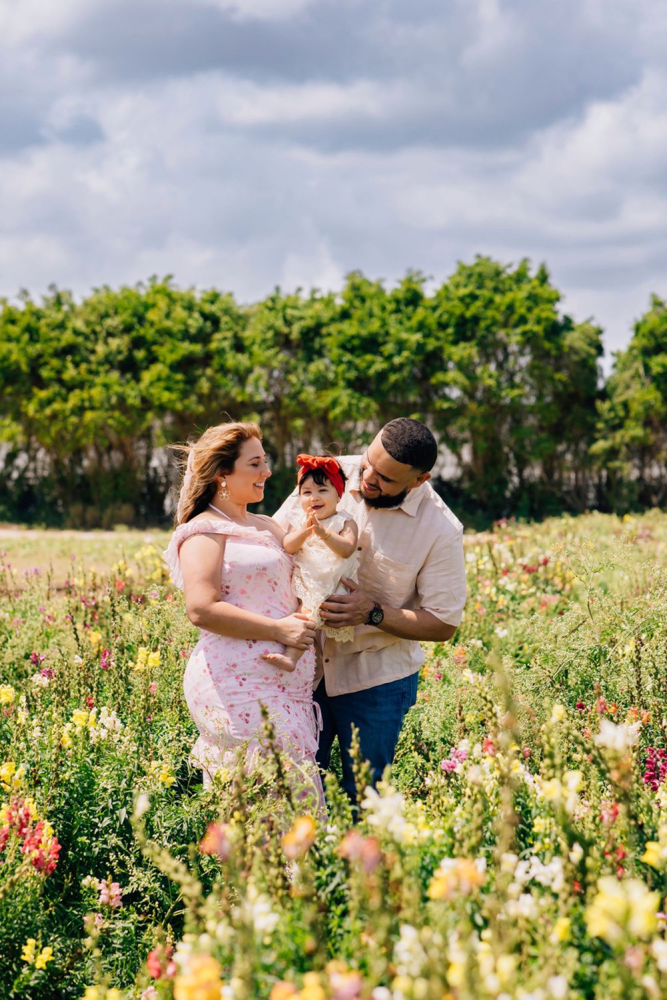 Candid family embrace in golden light