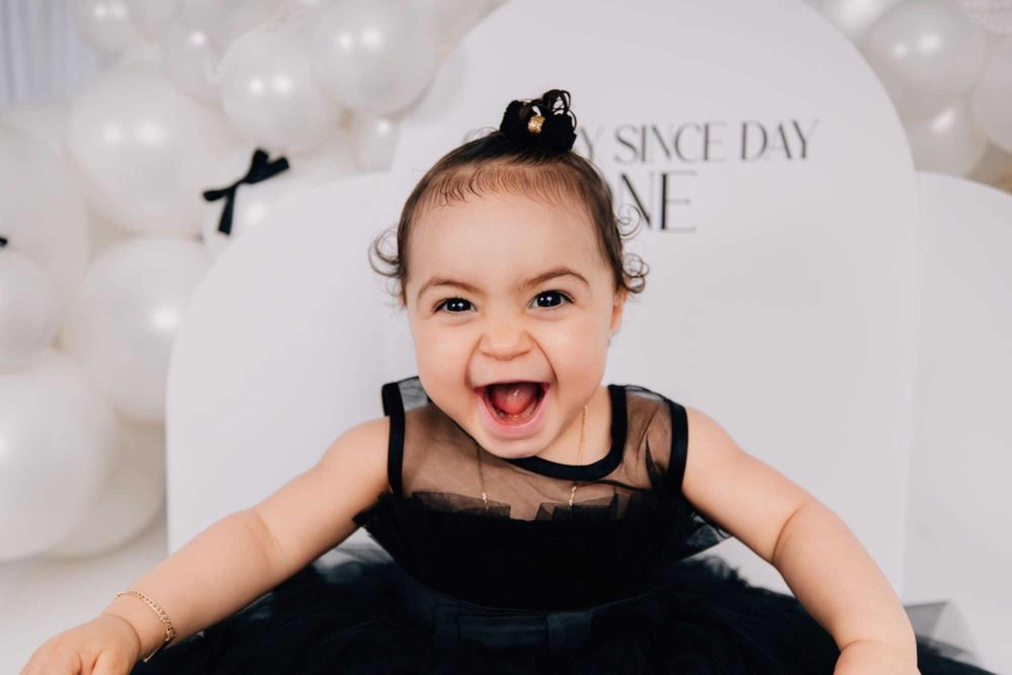 Child at play, captured mid-laugh